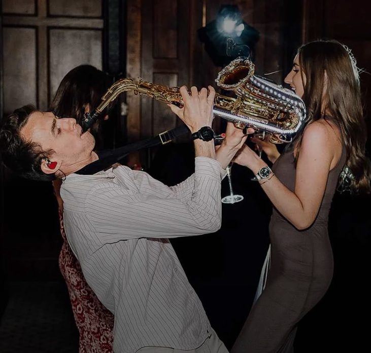 Saxophonist performing live at a wedding event
